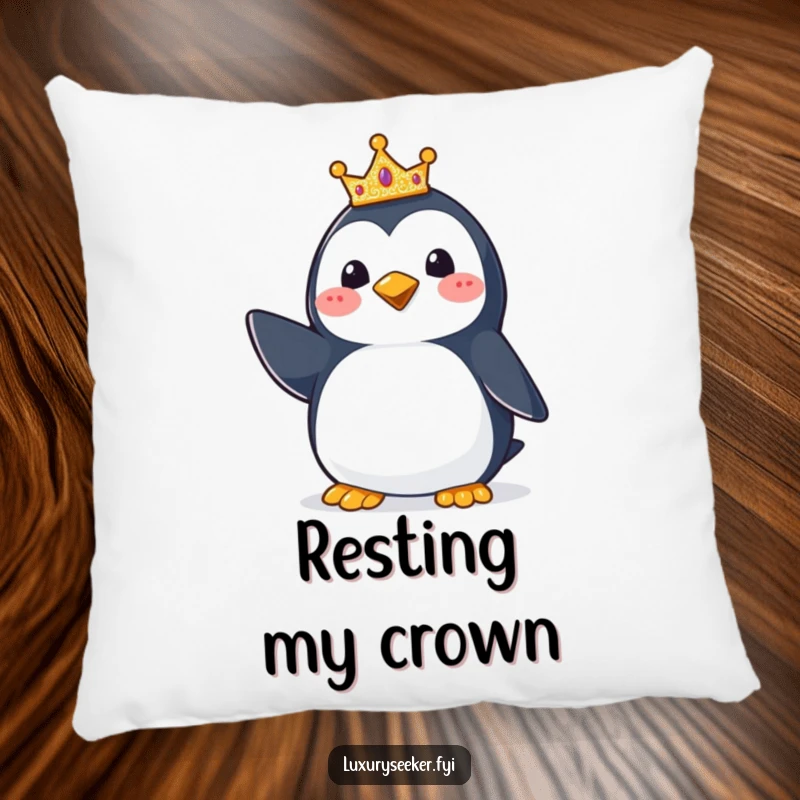 Funny Penguin Crown Pillow: A plush pillow featuring a happy penguin wearing a small, glittering crown, offering comfort and comical regal charm.