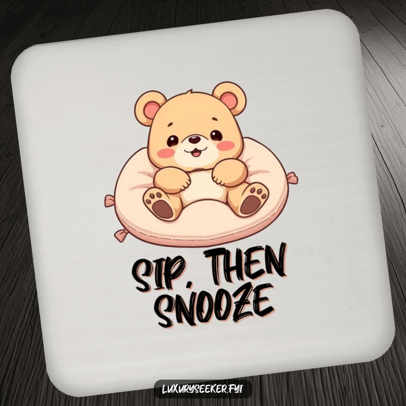 Funny drink coaster featuring a delighted bear lounging on a plush velvet cushion, adding humorous protection and style to tables.