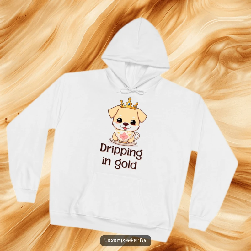 Funny Hoodie: A happy dog wearing a miniature crown, enjoying a sip from a golden teacup.