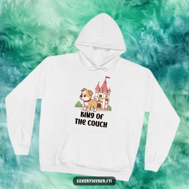 Funny determined dog guarding a miniature castle on a cozy hoodie, evoking protection, a funny gift.