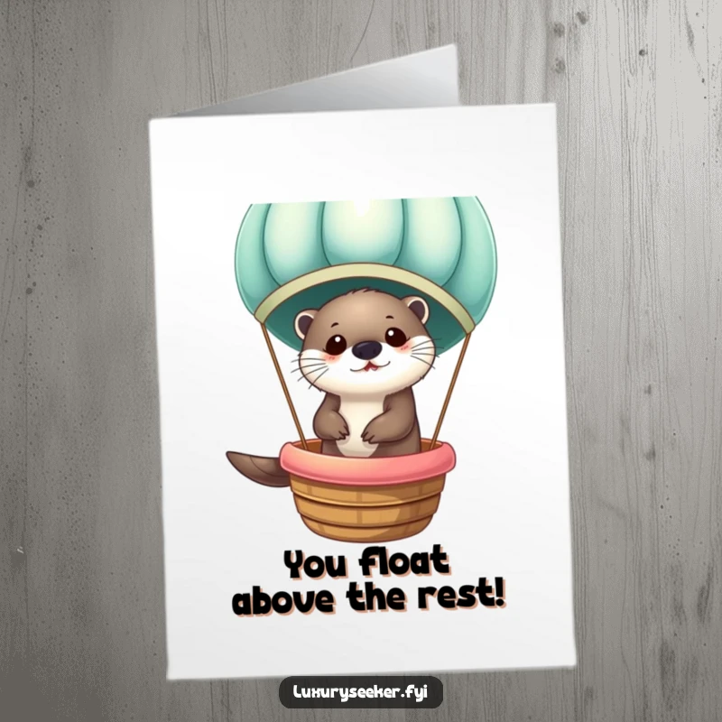 Funny Free Printable Congratulations Card: An otter joyfully rides in a luxurious velvet hot air balloon, celebrating achievements.