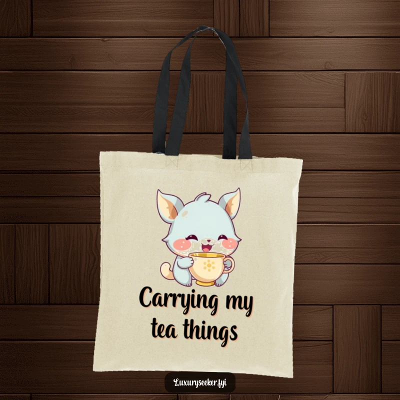 Funny tote bag featuring a joyful creature with a knowing smile sipping from a tiny golden teacup, embodying quiet pleasure.