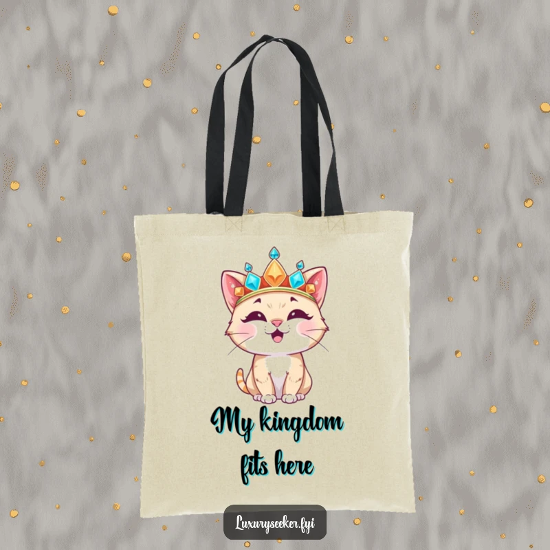 Funny Tote Bag showcasing a happy cat character adorned with an oversized, jeweled crown, perfect for carrying essentials with flair.